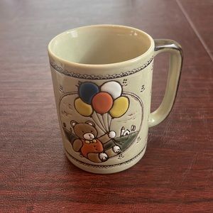 Mug with bear holding balloons